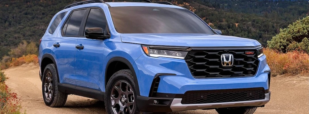 A blue 2025 Honda Pilot.