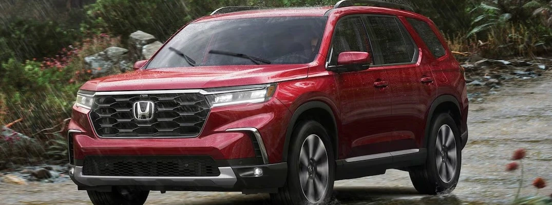 A red 2025 Honda Pilot.